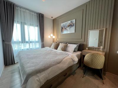 Rent Altitude Unicorn Sathorn-Tha Phra, 1 bedroom, separate living room, new, high floor, city view, walking distance to BTS Talat Phlu Washing machine, electric stove, hood, electric furniture ready