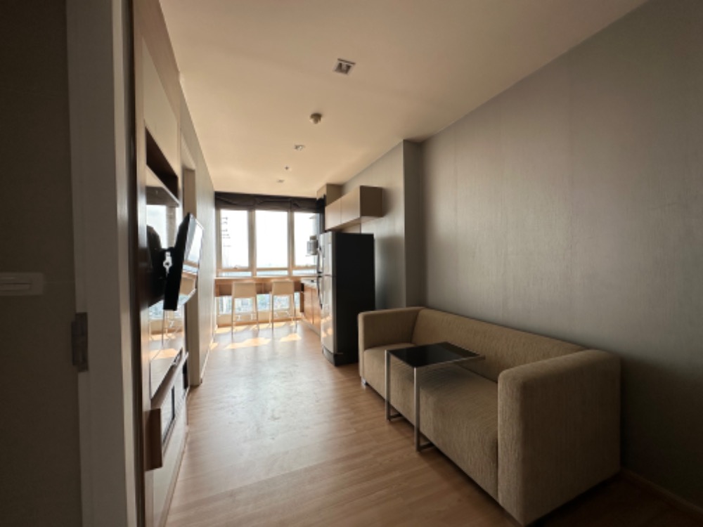 Rhythm Sukhumvit 50 Condo for sale with an existing tenant renting until Feb 2026, 1 bedroom, 35 sq m, 36th floor, east side with sky kitchen.