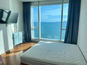 For Sale condo The Palm wongamat beach front pattaya 2 bed  (S03-1152)