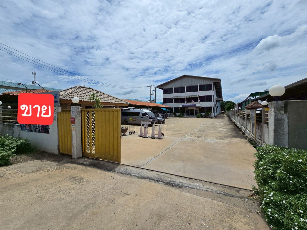 Land for sale with warehouses on an area of 2-3-55 rai on the main road 4 lanes.