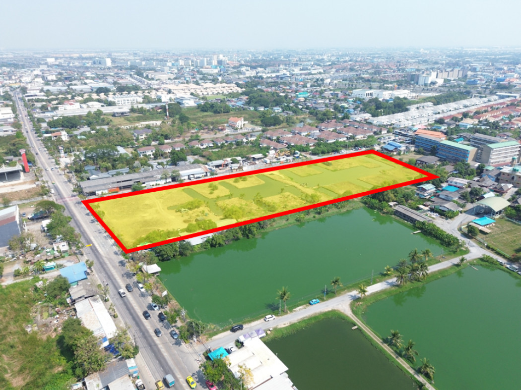 ขาย ที่ดิน ริมถนนเฉลิมพระเกียรติ ร.9 ขนาด 15 ไร่กว่า ผังสีเหลือง เหมาะทำจัดสรร KK