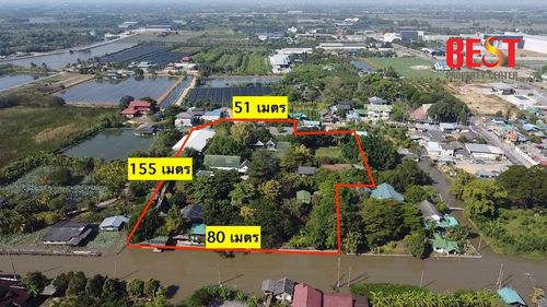 Land for sale along the Bang Yai River, large plot, can be further developed, including Wellness / Resort, good location, near Bangkok.