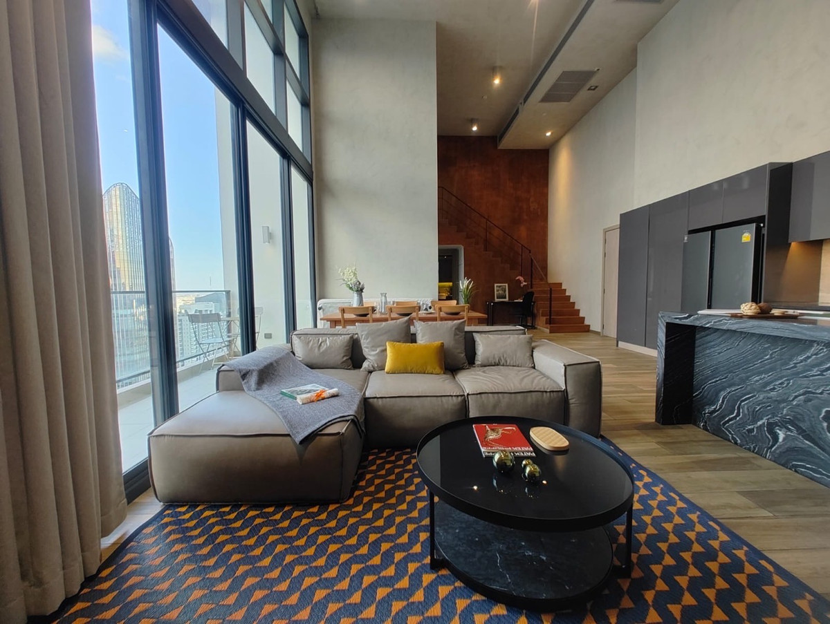 Duplex penthouse for sale Asoke near BTS Asoke MRT Sukhumvit tenant occupied 140000 THB monthly income until 2027