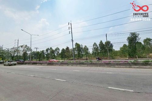 Land for sale, 19 rai, large plot, wide frontage, next to Nimit Mai Road, Khlong Sam Wa.