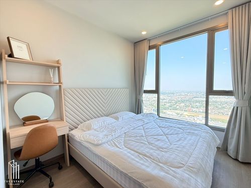 For rent: Whizdom The Forestias (Destinia) high-floor unit with unobstructed suburban view. Warmly decorated room. @30,000 Baht