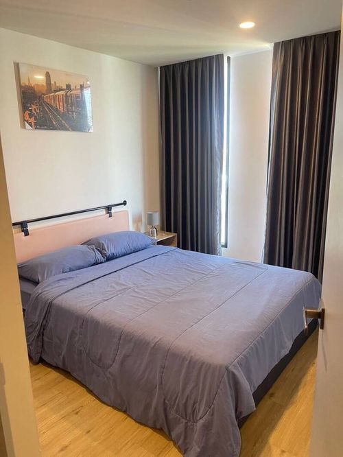 Condo for sale with tenant Attitude BU, receive immediate income, yield 6%, location opposite Bangkok University, price only 2 million.