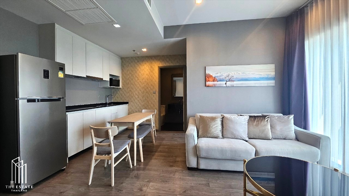 For rent Whizdom Avenue Ratchada-Ladprao, corner unit with wide frontage, 2 large bedrooms, east-facing for a refreshing sunrise, BTS view for positive energy, contrasting with a peaceful suburban view @33,000 Baht