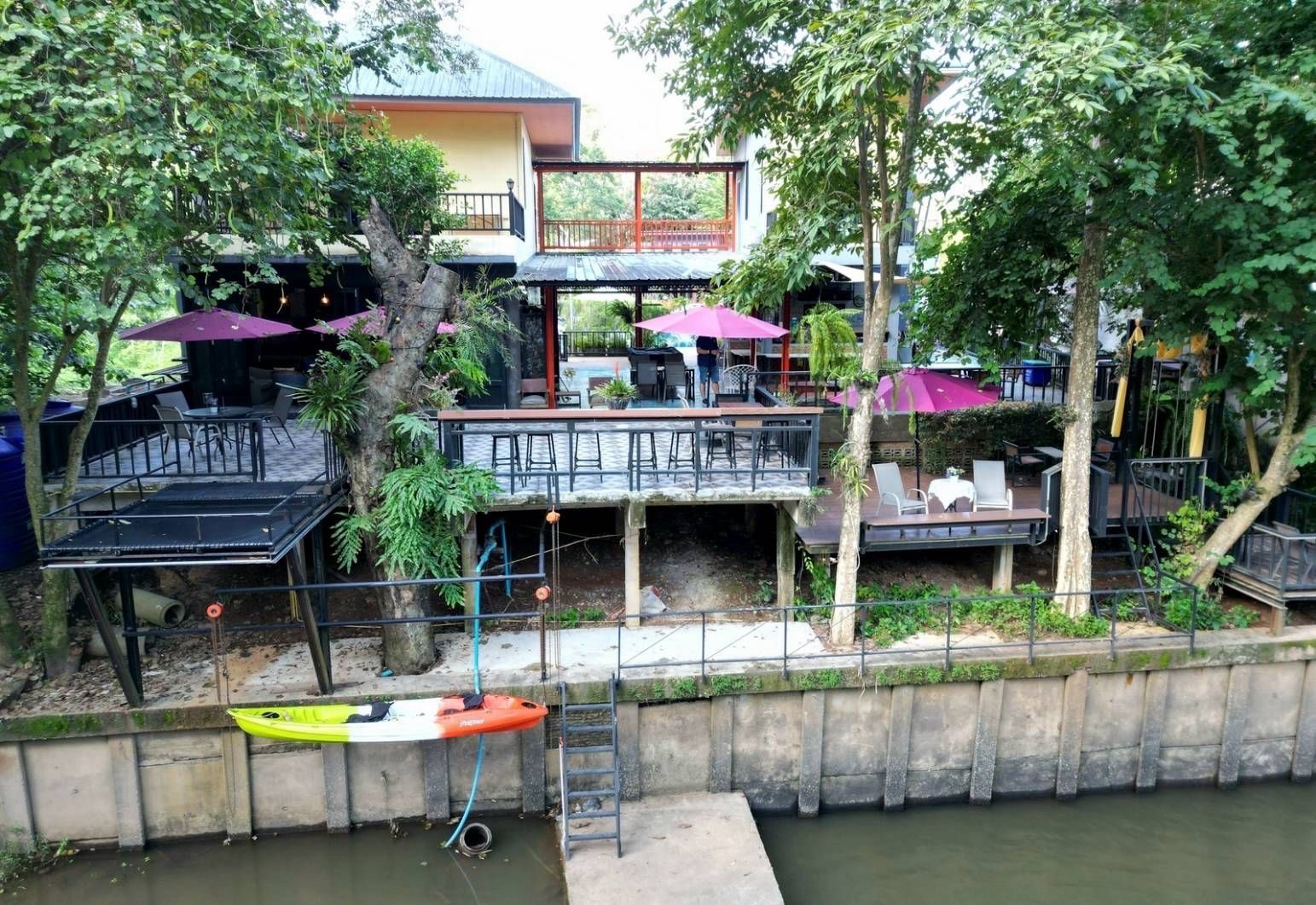 Khao Yai riverside pool villa for sale dual Lam Takhong frontage mountain view 9 bedroom resort investment Thanarat Road KM17