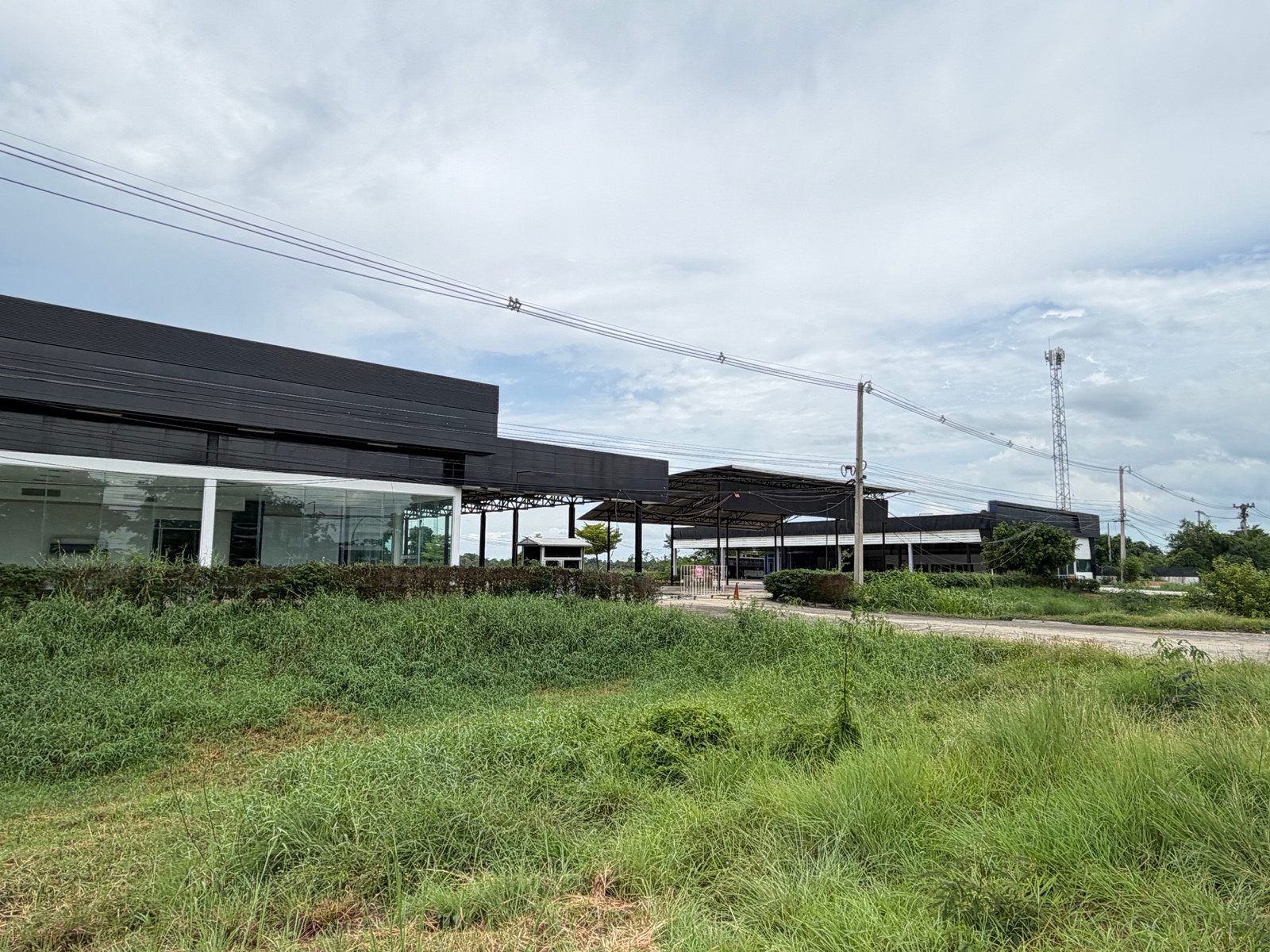 ⚡ For sale/rent, prime location, 5 rai, next to Asia, with showroom building and service center, supporting EV Charging Hub immediately.