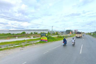 Land for sale, zoned purple (industrial/commercial), over 15 rai, located on Bang Bua Thong-Suphan Buri Road.