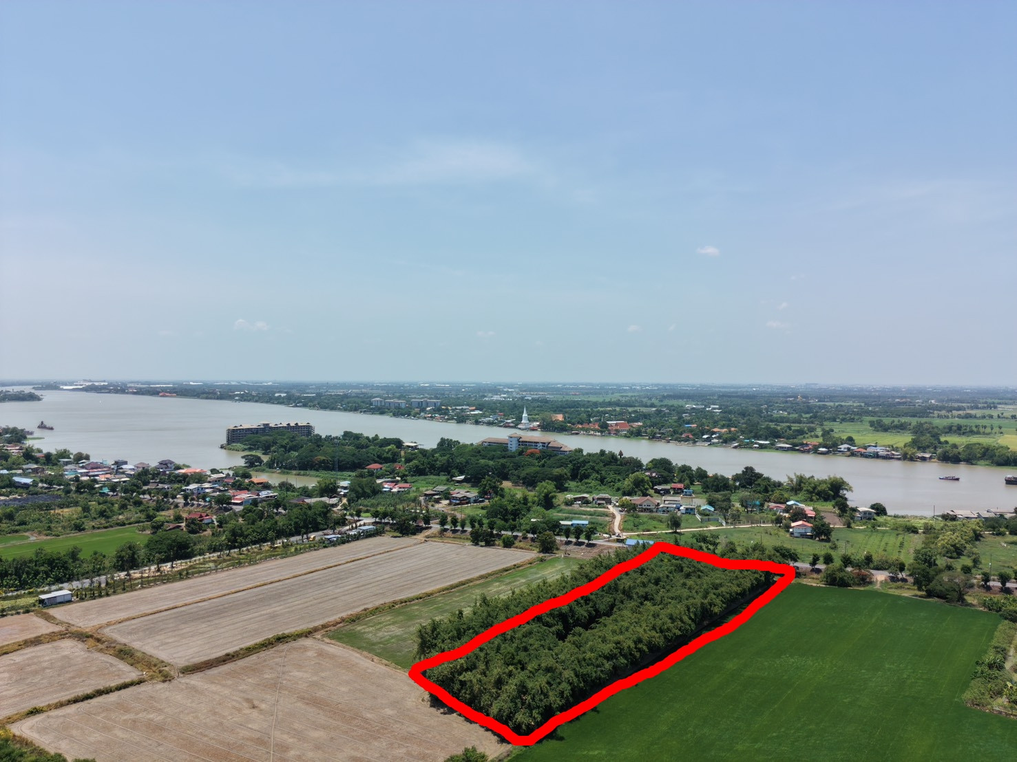 Land for sale, Tai Ko Subdistrict, Sam Khok District, Pathum Thani, size 6 rai 73 square wah, next to a public water canal, paved road.