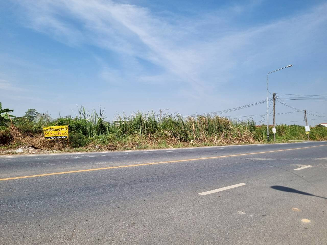 Land in Pathum Thani, Khlong 12, Lam Sai, next to the road, 4 rai 2 ngan 36 sq m. Beautiful plot