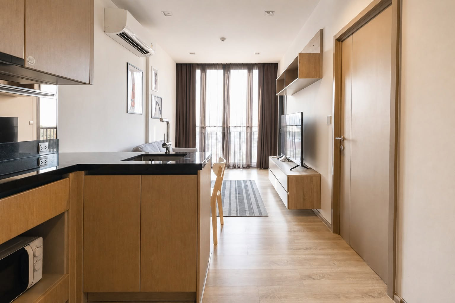 For rent, Kawa Haus, near BTS On Nut, open view room, 6th floor, not hot, fully furnished, ready to move in, Shuttle Bus to BTS, only 23,000 baht/month.