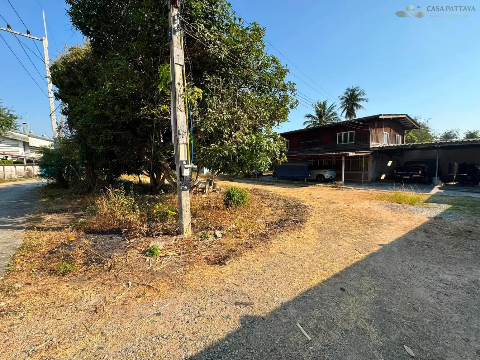 Land with Building for Sale in Prime Location Near Mabprachan Lake