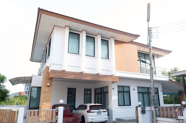2-story detached house for sale, Buriram, Sam O Village 3, waterfront, 108 sq m., has a private swimming pool, good location.