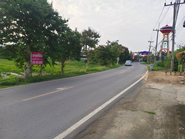 Land for sale, 27 rai 12 sq m, next to the road, Ban Chang Rojana 2, Uthai, Ayutthaya, green area. Potential location near Rojana Industrial Estate