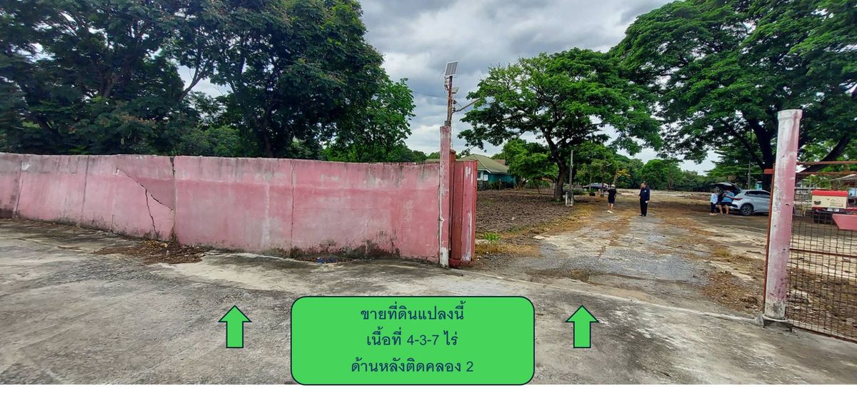 Land for sale, Lam Luk Ka 1 area, near Thusemee Golf Course, area 4-3-7 rai (filled), plus 2 houses
